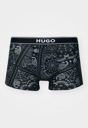 Zwarte boxershorts met een wit paisley- en spinnenwebpatroon, met een zwarte tailleband waarop de merknaam "HUGO" staat.