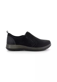 Scarpe slip-on nere con tomaia in tessuto morbido, zip laterale, suola grigia imbottita e dettagli di cucitura minimi. Design leggero ed ergonomico.