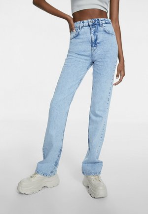 Light blue high-waisted jeans with a straight leg design, featuring faded detailing, stitched accents, and a classic five-pocket style.