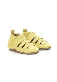 Chaussures en cuir jaune avec une semelle souple et flexible, affichant un design découpé, un collier élastique et une languette à l'arrière pour un enfilage facile.
