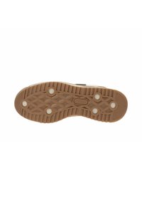 Suola delle scarpe con un design in gomma testurizzata di colore marrone chiaro, caratterizzata da boccole circolari e un motivo a battistrada per un'ottima aderenza e durata.