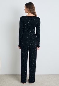 Lindex Pidžamas komplekts - black