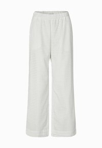 Pantalon blanc à jambes larges avec taille élastique et motif en tissu mesh découpé en carré.