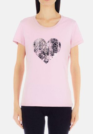T-shirt rosa a maniche corte con design di cuore nero in paillettes e motivo testurizzato, realizzato in un morbido misto cotone.