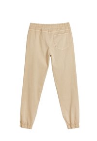 Beige, elastische broek met een tailleband, voorzien van gathered cuffs, een enkele achterzak en een gladde, lichte katoenen stof.