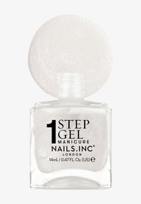 Klar glassflaske med gele-nail polish med sølvglitter, hvit kork, svart tekstetikett. Volum: 14 ml. Firkantet form med avrundede kanter.