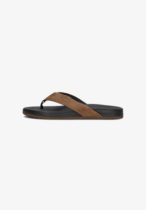 Brown leather flip-flop with perforated strap, black synthetic sole, and brown rubber outsole. Tapered design with subtle branding detail.