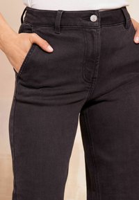 Friends Like These WIDE  - Flared Jeans - black