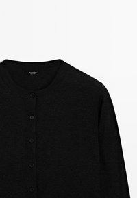 Black cardigan with a round neckline and button closure, featuring a subtle brand label in the neck area, centered on a plain background.