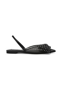 Sandales plates noires avec un design en mesh transparent, ornées d'une fleur en tissu et d'accents ressemblant à des perles sur la partie supérieure.