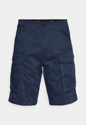Shorts cargo de culoare bleumarin, cu multiple buzunare, detalii cu fermoar și închidere cu nasture. Fabricate dintr-un material ușor, dar durabil, pentru versatilitate.