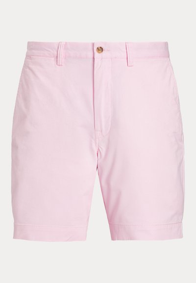 Rosa bomullsshorts med platt framstycke, knappstängning och uppvikta fållar. Har en mjuk textur och klassisk design.