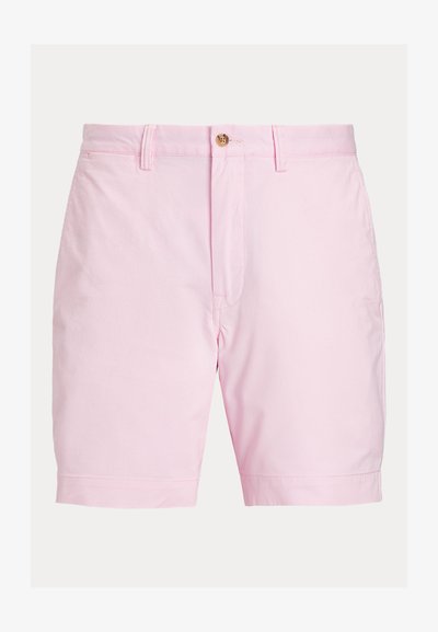 Rosa bomullsshorts med platt framstycke, knappstängning och uppvikta fållar. Har en mjuk textur och klassisk design.