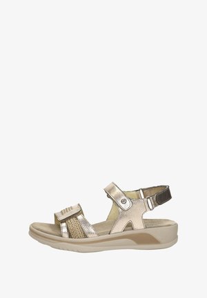 Women's metallic gold sandal with adjustable straps, cushioned sole, and woven detailing, designed for comfort and casual wear.