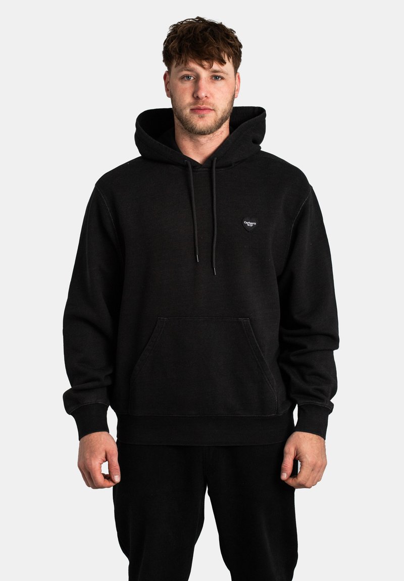 Black hoodie made of cotton with a kangaroo pocket, drawstring hood, and small logo on the chest. Ribbed cuffs and hem.