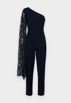 Salopetă navy cu un mânecă lungă din dantelă, corset mulat, design cu picior drept și textură netedă pe întreaga suprafață.