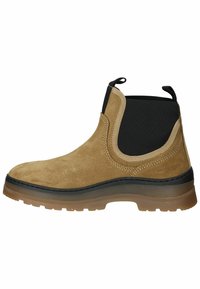 Hellbraune Wildleder Chelsea-Boots mit schwarzen elastischen Seiteneinsätzen, Gummisohle und Zuglasche; zeichnet sich durch eine glatte Textur und eine abgerundete Zehenform aus.
