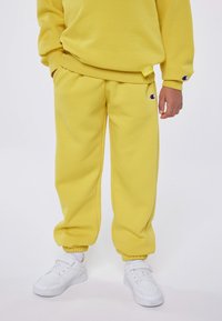 Champion - EXCLUSIVE PANT UNISEX - Treniņtērpa apakšdaļas - yellow Miniatūras attēls 1