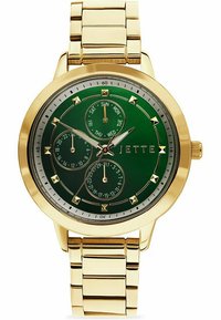 Goldfarbene Uhr mit einem runden grünen Ziffernblatt, das Tag, Datum und Uhrzeit anzeigt. Mit goldenen Akzenten und einem metallischen Armband ausgestattet.