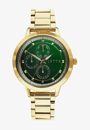 Montre dorée avec un cadran rond vert affichant les fonctions jour, date et heure. Présente des accents dorés et un bracelet métallique.