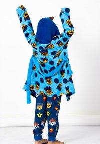 Blue fleece robe with a hood, featuring playful animal prints. Matching blue pajama pants with character designs and colorful accents.