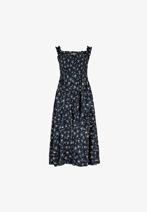 Navy blue floral midi dress with ruffled straps, smocked bodice, and flowy skirt featuring a scattered pink floral pattern.