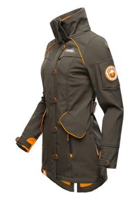 Dark green softshell jacket with orange accents, featuring a high collar, button closure, multiple pockets, and an embroidered logo on the sleeve.