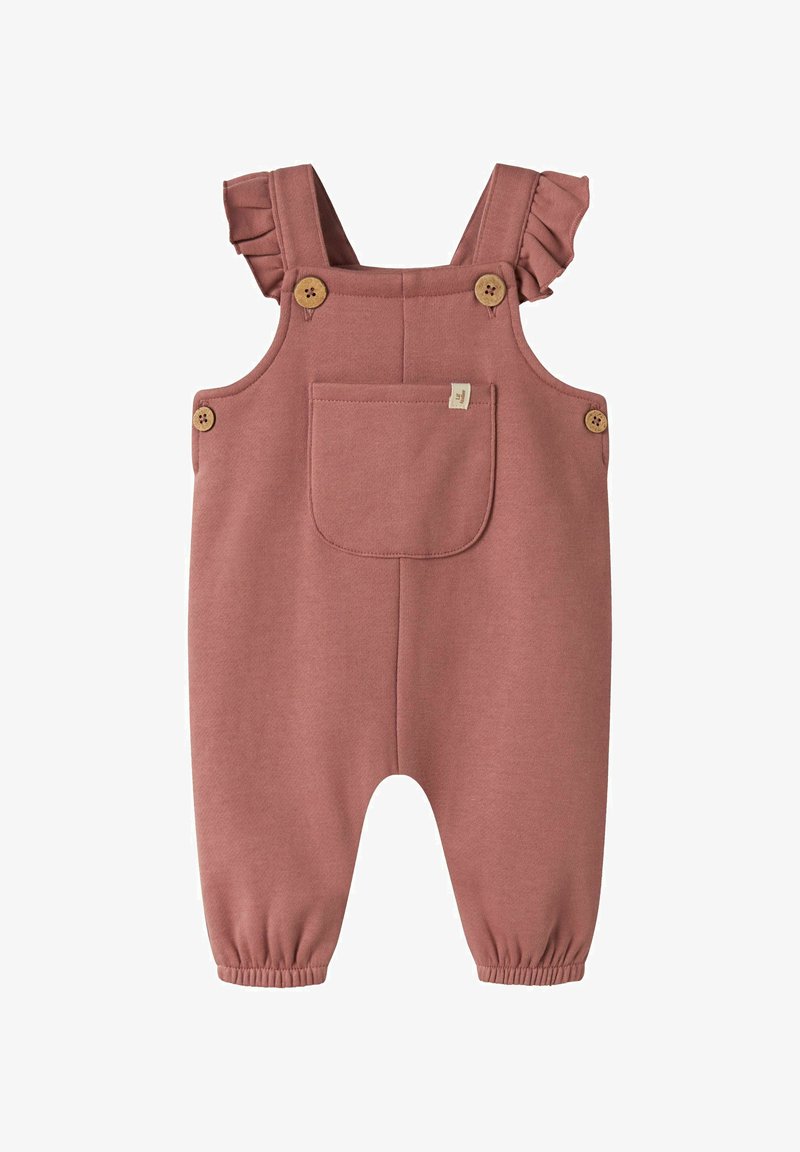Salopette rose douce pour tout-petit avec bretelles volantées, boutons en bois, poche avant et poignets élastiques aux jambes.