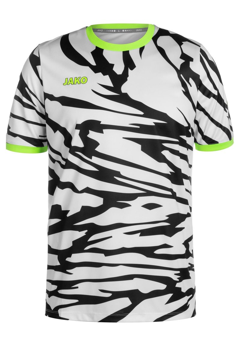 Biała koszulka z czarnymi abstrakcyjnymi paskami, zielony akcent na kołnierzyku i rękawach, wykonana z lekkiego materiału. Logo "JAKO" nadrukowane w neonowej zieleni.