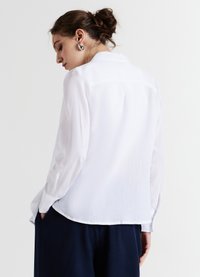 Calliope Hemdbluse - bianco ottico