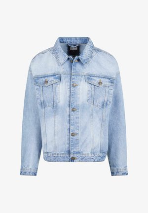 Chaqueta de mezclilla azul claro con cierre de botones en el frente, dos bolsillos en el pecho y mangas largas. Presenta una textura desgastada y detalles metálicos en tono dorado.