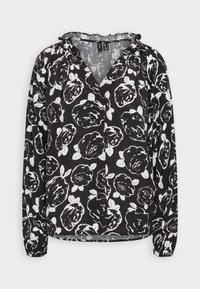 Blusa nera con motivo floreale bianco, dotata di chiusura a bottoni, scollatura arricciata, maniche lunghe e polsini elastici. Tessuto leggero.