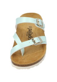 Light blue faux leather sandal with two adjustable straps, a brown suede footbed, and a white rubber sole. Buckles are silver-tone.