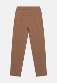 Pantalons de sport marron en tissu extensible, dotés d'une taille élastique et d'une petite poche zippée au dos. Texture lisse, design ajusté.