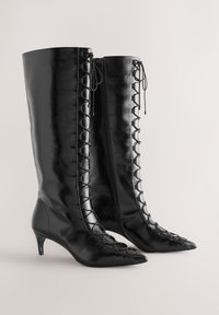 Botas con cordones - black