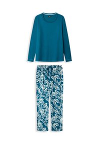 Haut long bleu-vert à encolure ronde, associé à un pantalon bleu avec un motif floral blanc et une taille élastique.