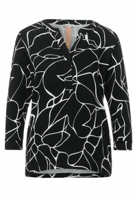 Svart tunika med vitt abstrakt blommönster, V-hals, trekvartsärmar och avslappnad passform. Tillverkad av lättviktsmaterial.