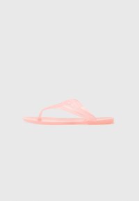 Rosa plasttofflor med en minimalistisk design, som har tunna remmar och en platt sula, båda genomskinliga med en slät yta.