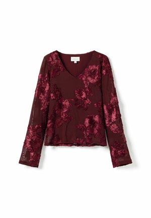 Burgunder langærmet top med V-hals, prydet med blomsterbroderi og gennemsigtig struktureret stof. Dekorationer omfatter detaljerede blomstermønstre.