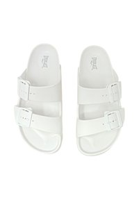 Sandali bianchi con due fasce regolabili e fibbie. Realizzati in materiale liscio e flessibile. Soletta curvata per il comfort. Design semplice e funzionale.