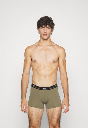 Boxer-briefs en coton olive avec une ceinture noire arborant le logo "BOSS". Près du corps avec une texture lisse.