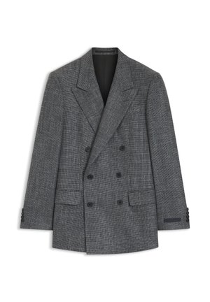 Dvoslojni sivi tweed blazer z zareznimi ovratniki, šestimi črnimi gumbi, žepi z zaponkami in štirimi gumbi na manšetah, položen na ravno belo ozadje.