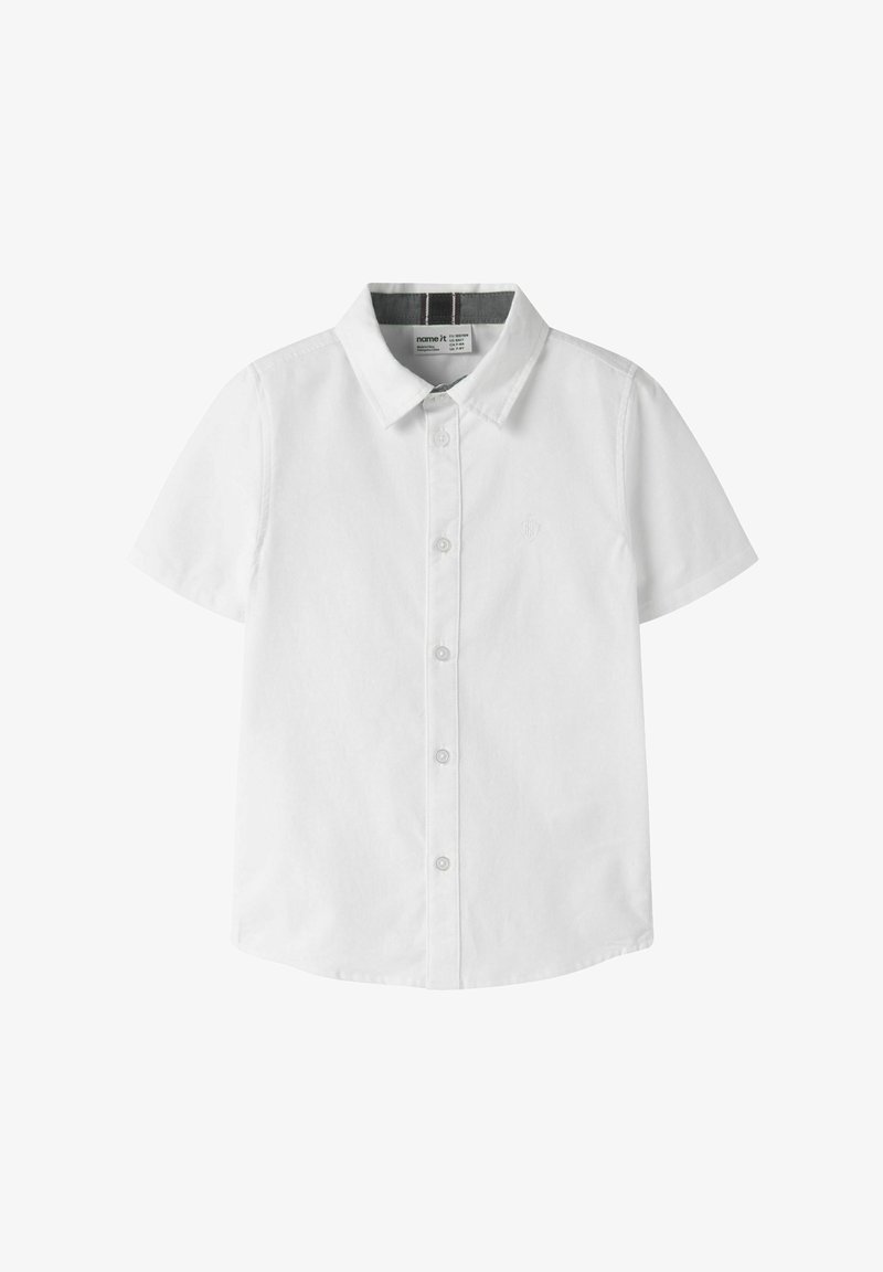 Λευκό πουκάμισο με κοντό μανίκι, κουμπιά μπροστά, γιακά και διακριτικό κεντημένο λογότυπο στο αριστερό μέρος του στήθους.