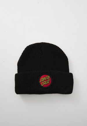 Gorro de malha preto com a aba dobrada, apresentando um patch redondo em vermelho e amarelo com o logótipo "Santa Cruz" no centro frontal.