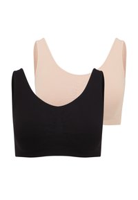 Two wireless bras are shown: one in black and one in beige. Both have a smooth, stretchy fabric with a wide band and scoop neckline.