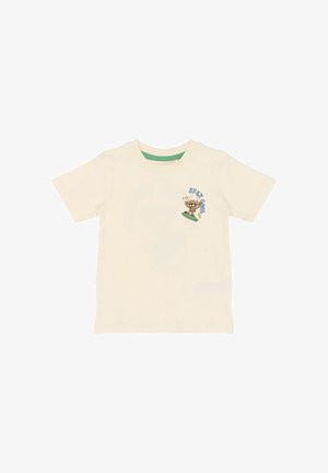 Cremefarbenes Baumwoll-T-Shirt mit kurzen Ärmeln, grünem Innenkragen, mit einer Cartoon-Grafik eines Hundes auf einem Surfbrett.