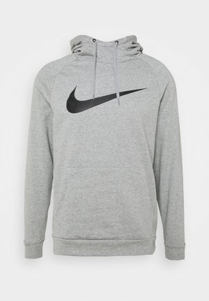 Haut à capuche gris en polaire avec une poche kangourou, présentant un grand logo Nike noir à l'avant et des cordons au niveau de la capuche.