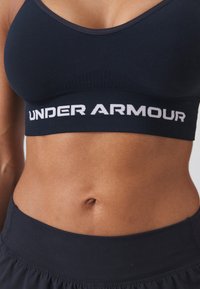 Under Armour VANISH LOW - Sutien sport cu susținere scăzută - black/white