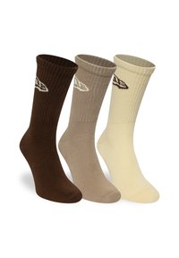 Drei Paar Socken in Braun, Taupe und Elfenbein. Gerippte Textur mit einem Blatt-Logo-Design auf jeder Socke. Weiches Material, mittellange Crew-Länge.