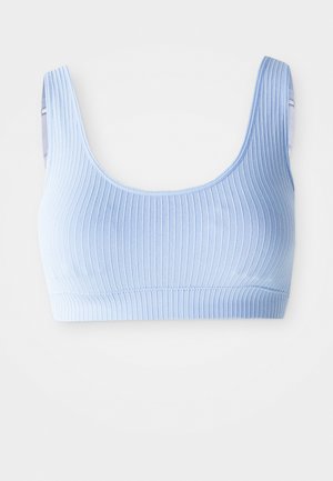 Light blue ribbed bralette with wide straps and a round neckline. Slightly stretchy fabric and a seamless design for comfort.